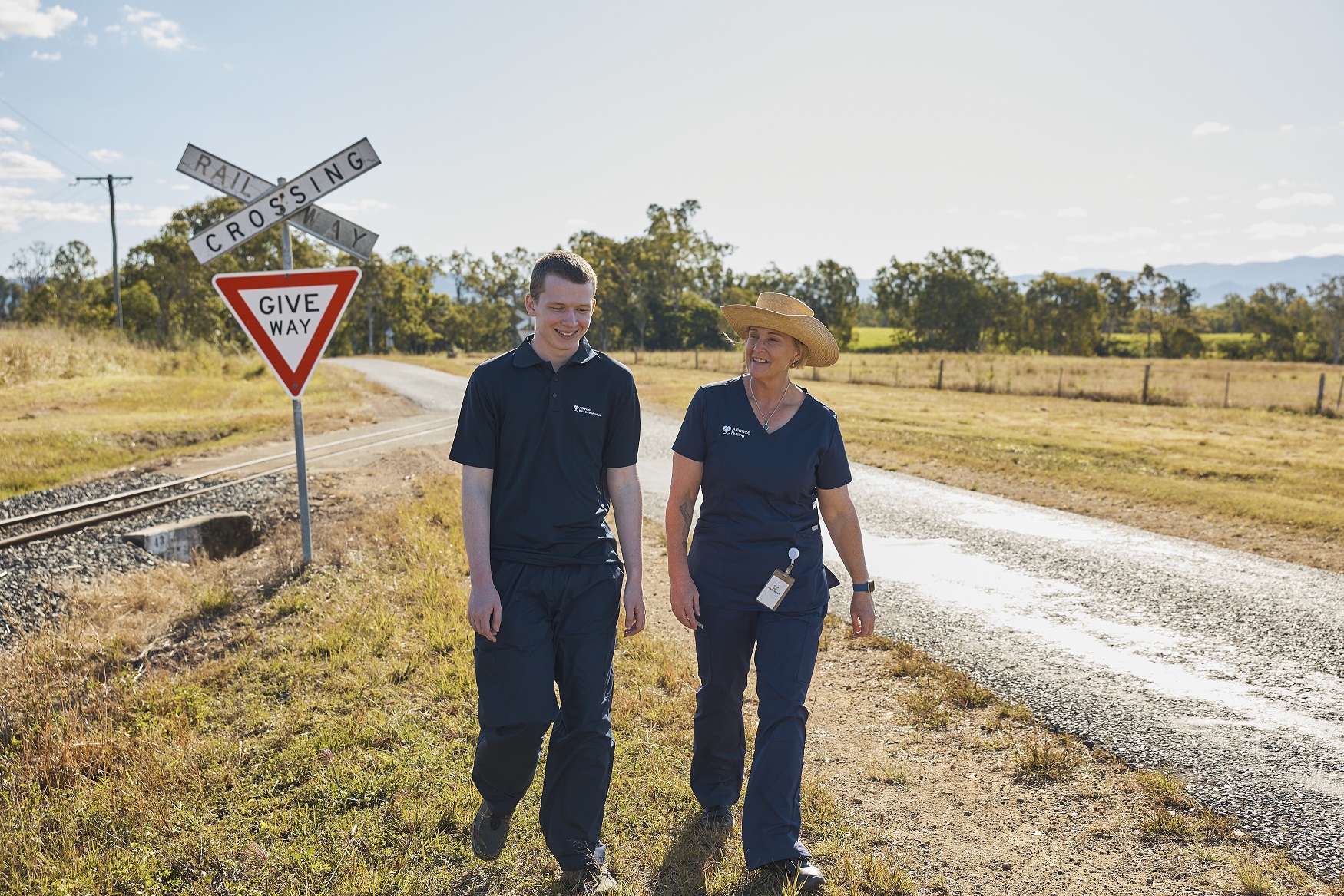 Nurses near give way sign